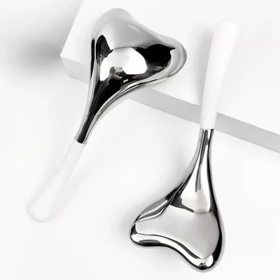 Arcmasszírozó kanál