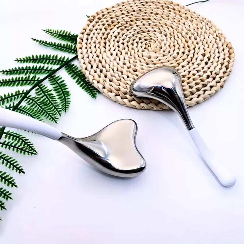 Arcmasszírozó kanál